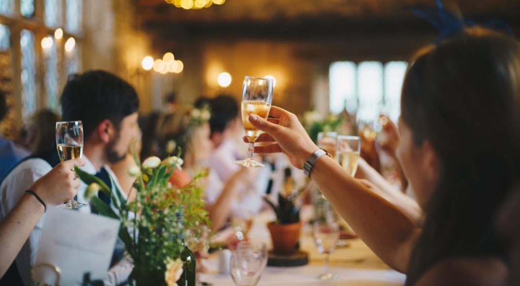 Wedding reception with people toasting
